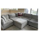 Multi-Piece Tufted Fabric Sectional Sofa with Ottoman