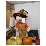 Small Collection of Fall Decorations w/ Pumpkins, Spiders, and a Mickey Mouse Scarecrow
