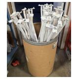 Barrel of White Metal Closet Rods