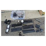 Assorted Computer Keyboards, Headphones, Cables, and Accessories Collection