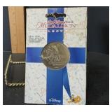 A Walt Disney World 30th Anniversary Brushed Nickel Medallion From The Collectible Souvenir Series - Potterville