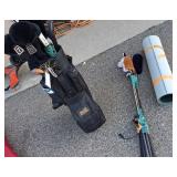 Golf Clubs, Shoes, and Practice Putting Green