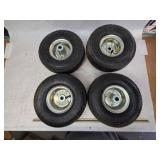 Set of 4 Like New 4.10-3.50-4 Tires