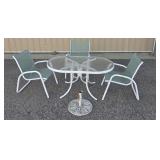 Glass Topped Patio Table with 3 Chairs and Umbrella Stand