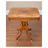 Antique Victorian Eastlake-Style Wooden Parlor Table on Casters