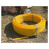 ROLL OF YELLOW PIPE