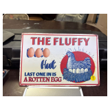 THE FLUFFY HUT SIGN
