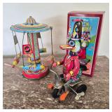 Schylling Retro Tin Duck on Bike and Rocket Carousel