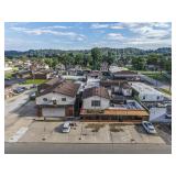 Multi-Building Huntington Investment Property: Warehouse, Shops, Apartments, & Vacant 