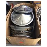 Various old car wheel covers