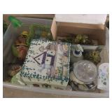 Ocean-themed garden decor featuring seashells frog clock and figurine
