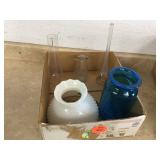 Assorted glass items including cream bottle and lamp chimney