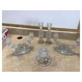 Varied styles sizes and materials for decorative candle displays
