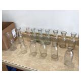 Varied glass containers for dairy and wine