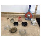 Collection of unique vintage casino ashtrays drinkware and decanter