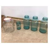 Vintage blue Mason jars and peanut butter refrigerator jar with lid
