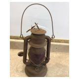 Kerosene railroad lantern with red lens