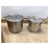 Two stock pots one coffee carafe