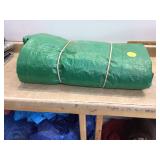Oversized green cover for protection storage