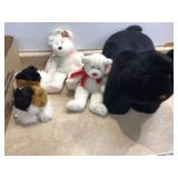 Oversized beanie babies and black bear plush toy