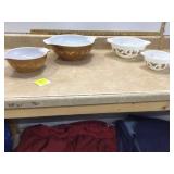 Colored glass mixing bowls that stack together