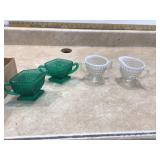 Indiana green glass and clear hobnail sugar and cream sets feature textured