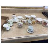 Assorted creamers and sugar bowls for serving beverages