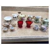 Assorted cream and sugar containers
