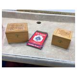 Wooden boxes containing playing cards