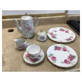 Teapot set with cream sugar plates cups