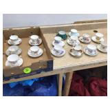 Variety of decorative teacups and matching saucers