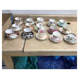 Varied collection of teacups with matching saucers