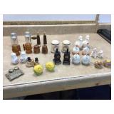 Varied collection of salt and pepper containers