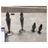 Elegant salt and pepper dispensers with a silver finish