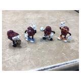 Collectible ceramic figurines of California Raisins inspired by the animated music