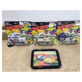 Three racing cars with NASCAR plaque