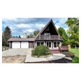 Three bedroom Chalet home on 40 acres and pole Barn and 2 Artesian wells