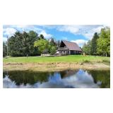 Three bedroom Chalet home on 40 acres and pole Barn and 2 Artesian wells