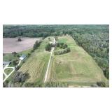 Three bedroom Chalet home on 40 acres and pole Barn and 2 Artesian wells