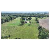 Three bedroom Chalet home on 40 acres and pole Barn and 2 Artesian wells