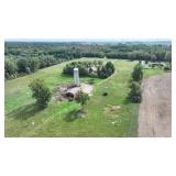 Three bedroom Chalet home on 40 acres and pole Barn and 2 Artesian wells