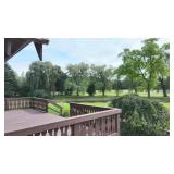 Three bedroom Chalet home on 40 acres and pole Barn and 2 Artesian wells
