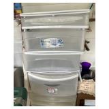 Several totes and organizing drawers 