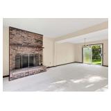 Living Room with Wood-Burning Fireplace