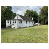 RAISED RANCHER W/ ATT. 1-CAR GARAGE & DET. GARAGE WORKSHOP W/ HEAT ON 0.34 +/- AC PRIVATE LOT