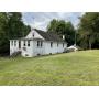 RAISED RANCHER W/ ATT. 1-CAR GARAGE & DET. GARAGE WORKSHOP W/ HEAT ON 0.34 +/- AC PRIVATE LOT