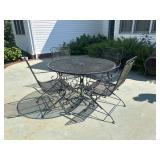 #510 • Wrought Iron table and 4 chairs