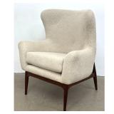Lot 710  Contemporary Modern Lounge Chair. Egg form back on Tapered wood legs. 