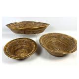 Lot 799  3pc set of woven rattan and polished brass decorative bowls in the mid century modern style includin