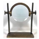 Lot 852  Art Deco style brass desktop magnifying glass on trestle stand. Made in India.